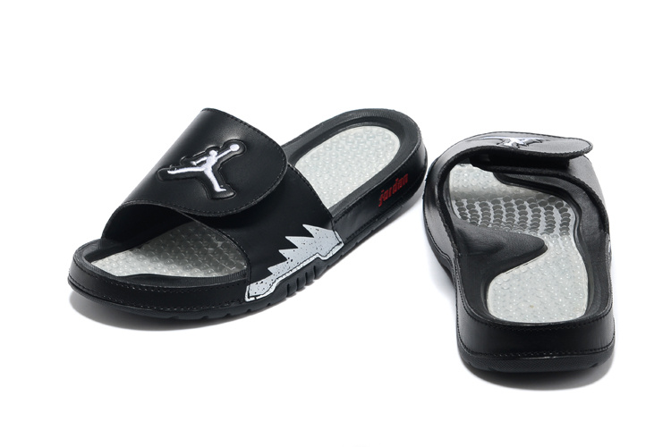 purple and black jordan slides